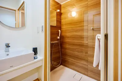 a bathroom with a shower and a sink at M302 Hibiya Line Sannotsu Station 5 min by foot! First line direct to Ueno, Akihabara, Tsukiji Market, Ginza!Close to Asakusa Temple!! in Tokyo