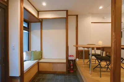 a small room with a bed and a table at 'OOGI House' Spacious Restored Traditional Machiya 53m2 with Tatami in Tokyo