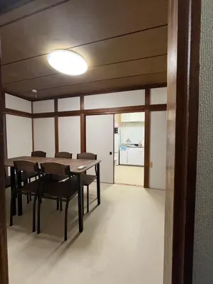 a dining room with a table and chairs at Abeno house at Koenji in Tokyo