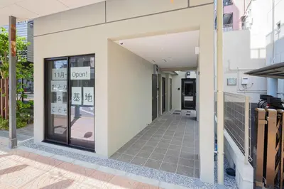 a walkway outside of a building with a store window at \u30ec\u30b8\u30c7\u30f3\u30b9\u30d1\u30fc\u30af\u6d45\u8349 in Tokyo