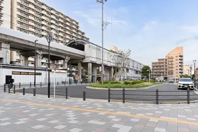 a parking lot in a city with a building at Suzume sky house in Tokyo
