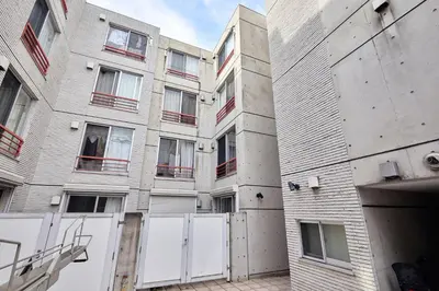 an external view of an apartment building at 3-min walk to bus stop, direct to Shibuya Shinjuku in Tokyo