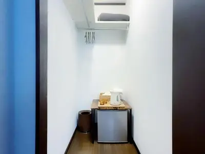 a room with a table with a coffee maker on it at Mando Hotel 401 ,direct to Ueno, Asakusa in Tokyo