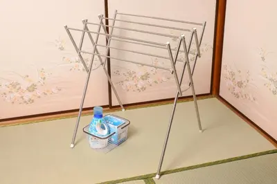 a bathroom with a rack with a bottle in it at \u7985-zen-Tokyo Itabashi in Tokyo