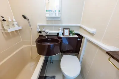 a bathroom with a sink and a toilet at Kamimachi Stay102 in Tokyo