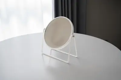 a mirror sitting on top of a white table at Kamimachi Stay102 in Tokyo