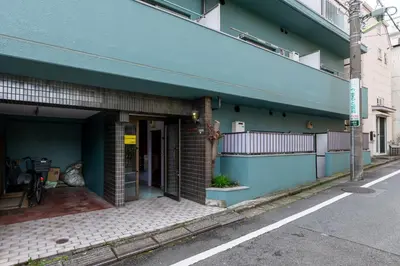 an entrance to a building on a street at Kamimachi Stay102 in Tokyo