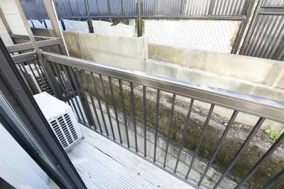 a balcony with a metal fence and a bench at AirHOMETOKYO EBISU 202 in Tokyo
