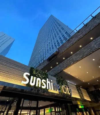 a suntec city sign in front of a building at 5-min walk from Higashi-Ikebukuro your second home in Tokyo