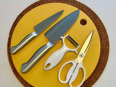 a plate with a bunch of scissors on it at Designer 2BR with Japanese & Western Style Near Shinjuku Subway 5-Min up to 6 people in Tokyo
