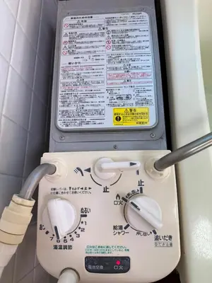 a gas meter in a bathroom with two mice on it at LT Oshiage in Tokyo