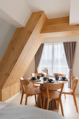 a dining room with a wooden table and chairs at House Hotel Shin Ekoda401 DE41 in Tokyo