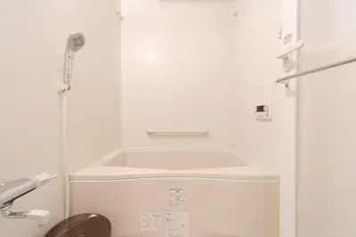 a white bathroom with a toilet and a sink at House Hotel Shin Ekoda401 DE41 in Tokyo