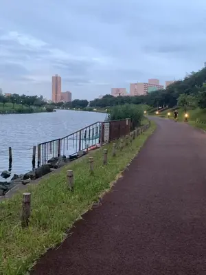 a road next to a body of water at Quiet and beautiful house nearby Tokyo Skytree in Tokyo