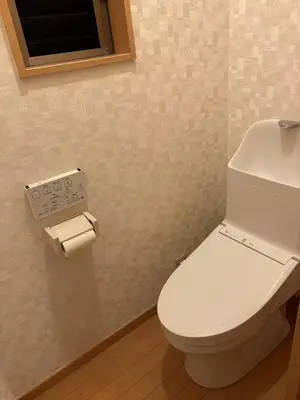 a bathroom with a white toilet and a window at Quiet and beautiful house nearby Tokyo Skytree in Tokyo