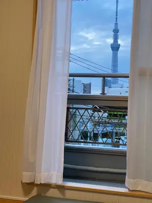 a window with a view of the eiffel tower at Quiet and beautiful house nearby Tokyo Skytree in Tokyo