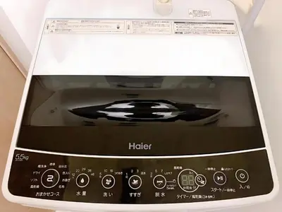 a microwave oven with a picture of a cake at Harajuku house in Tokyo