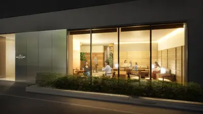 a group of people sitting inside of a building at WAYPOINT TSUKIJI Tokyo in Tokyo