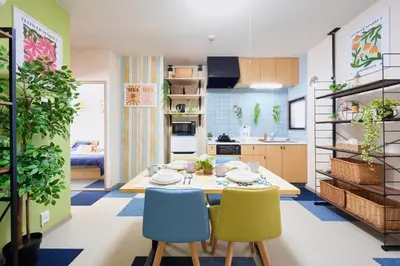 a kitchen and dining room with a table and chairs at Shamrock Aoto 304 Cozy Tokyo Stay Near Station Airport Disney Access in Tokyo