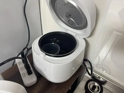 a close up of a toilet with a sink at \u3055\u304f\u3089\u65c5\u9928 \u9ad8\u5186\u5bfa\u5317\u5343\u5229\u4f11 \uff42102\u53f7\u5ba4 in Tokyo