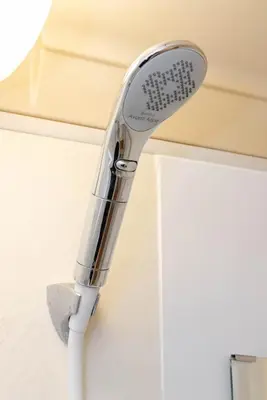 a shower head hanging from a ceiling at Maison Shin Nakano 101 MS11 in Tokyo