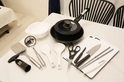 a table with a bunch of kitchen utensils on it at Espada KAMEARI 103 in Tokyo