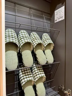 a bunch of towels on a rack in a closet at jlb\u30b0\u30e9\u30f3\u30a8\u30af\u30ea\u30e5\u521d\u53f0 101 in Tokyo