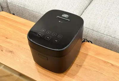 a black electronic device sitting on a table at Js Asakusa 6-minute walk from Asakusa Station in Tokyo
