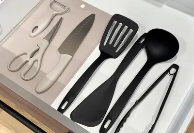 a group of utensils sitting on top of a drawer at Js Asakusa 6-minute walk from Asakusa Station in Tokyo