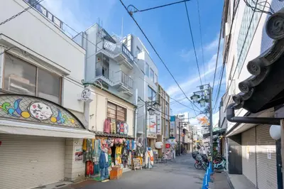 an alley with shops and buildings on a street at Js Asakusa 6-minute walk from Asakusa Station in Tokyo