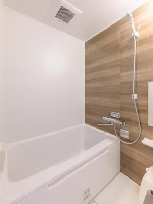a bathroom with a white tub and a shower at Hotel Shibamata Tokyo in Tokyo