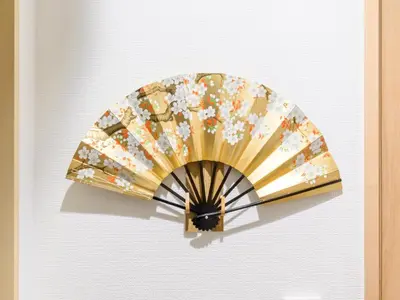 a fan is hanging on a wall at Hotel Shibamata Tokyo in Tokyo