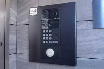 a vending machine on the side of a wall at Sunbright Asakusa 101 in Tokyo