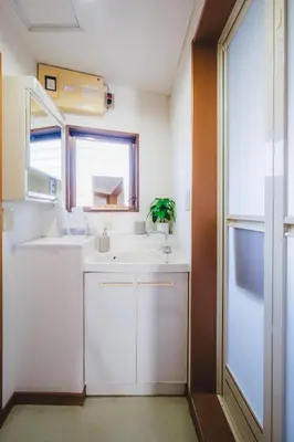 a small kitchen with a sink and a window at KR Fit Stay Kami-Itabashi in Tokyo