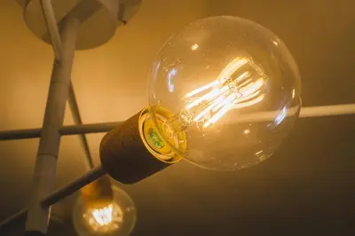 a light bulb is attached to a lamp at KR Fit Stay Kami-Itabashi in Tokyo