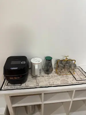 a counter with a toaster and a toaster on it at gt house in Tokyo
