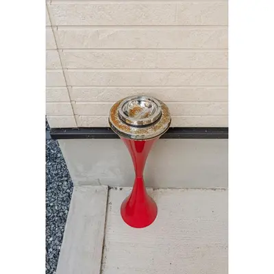 a red spoon sitting on the side of a building at Minami Inn 3 bed rooms Villa 8 minutes walk from JR line Koiwa station For Family in Tokyo