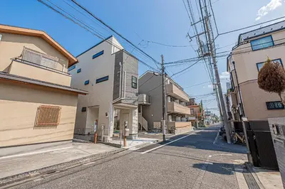 an empty street in a city with buildings at Minami Inn 3 bed rooms Villa 8 minutes walk from JR line Koiwa station For Family in Tokyo