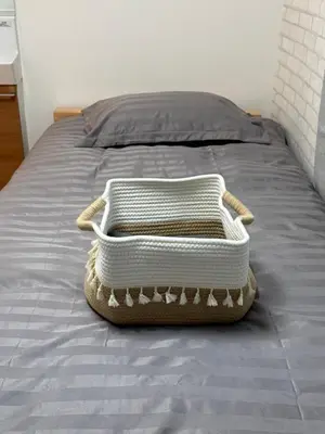 a basket sitting on top of a bed at 15 min to Shinjuku, 4 min walk to nearest station, quiet brand-new residence in Tokyo