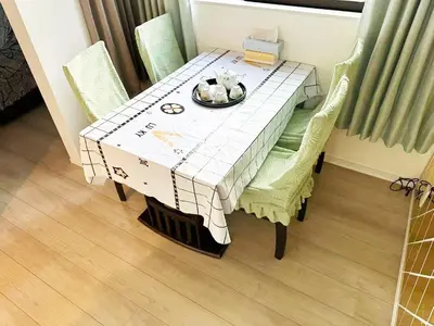 a dining room table with a plate of food on it at \u56db\u4eba\u90e8\u5c4b\u30d5\u30a1\u30df\u30ea\u30fc\u30bf\u30a4\u30d7 in Tokyo