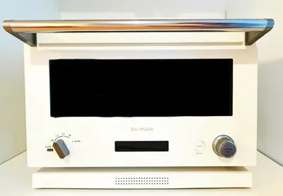 a white microwave oven with a tv on top at Newly Built Detached Villa 5 min walk to JR Tabata Station Yamanote Line in Tokyo