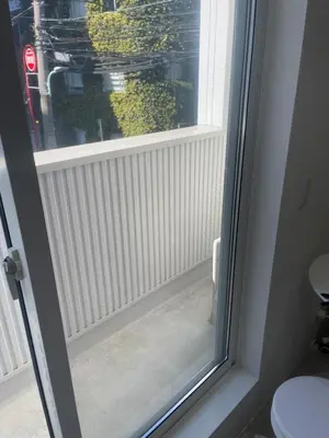 a bathroom with a window with a radiator at CIENtONCE BLD in Tokyo