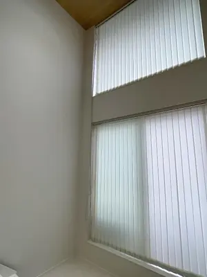 a room with a large window with white blinds at CIENtONCE BLD in Tokyo