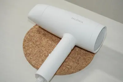a toaster sitting on top of a cork board at INA HOUSE Koiwa 202 in Tokyo