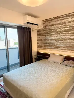 a bedroom with a large bed and a large window at ToKyo\u6d45\u8349 GA in Tokyo