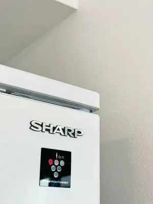 a white refrigerator with a star sign on it at ToKyo\u6d45\u8349 GA in Tokyo