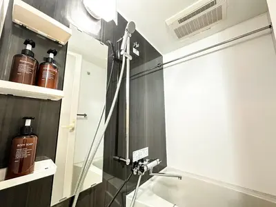 a shower stall in a bathroom with a shower at Shinjuku Center 2 Singles Cozy Apt, Free WiFi in Tokyo