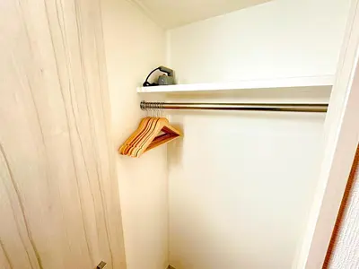 a kitchen with a refrigerator with a shelf above it at Shinjuku Center 2 Singles Cozy Apt, Free WiFi in Tokyo