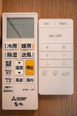 an electronic calculator with chinese writing on it at louis stage \u897f\u30f6\u539f 101\u5ba4 in Tokyo