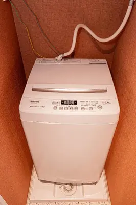 a white washing machine sitting in a box at Mi-Hotel Asakusa Senso-ji in Tokyo